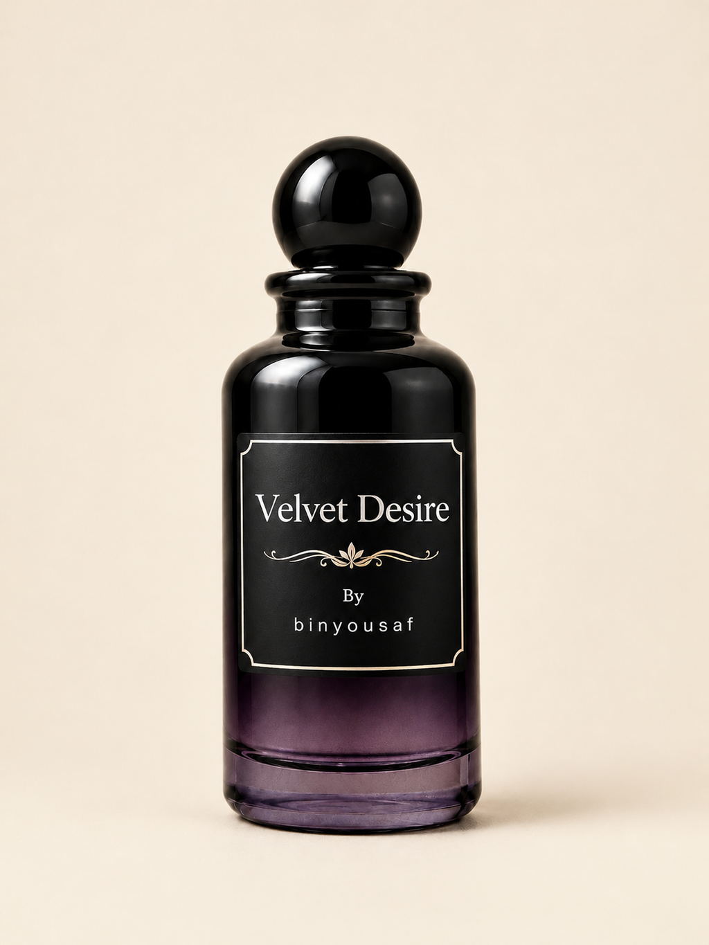 A dark glass perfume bottle with a black spherical cap and a black label reading 'Velvet Desire By binyousaf' on a warm beige background.